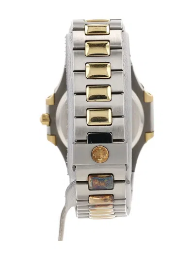 Pre-owned Patek Philippe 1990 Nautilus 32mm In Black