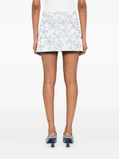Coperni Floral-jacquard Wrap Mini Skirt In Gray