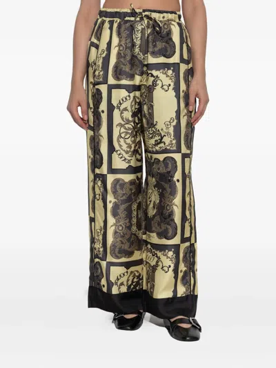 Ganni Silk Ornate Print Trousers In Yellow
