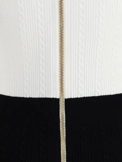 Balmain V-neck Buttoned Strong-shoulder Torsade Knit Mini Dress In Black