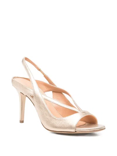 The Seller Sandals In Platinum Leather In Gold