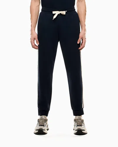 Ea7 Logo Series Cotton-blend Joggers In Blue