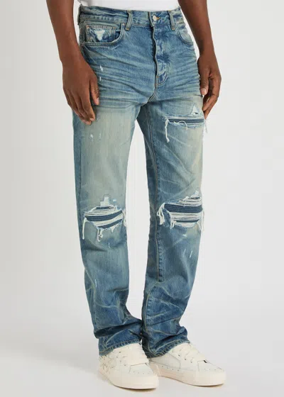 Amiri Men Blue Jeans With Ripped Details On The Front And Logo Patch On The Rear In Denim Man