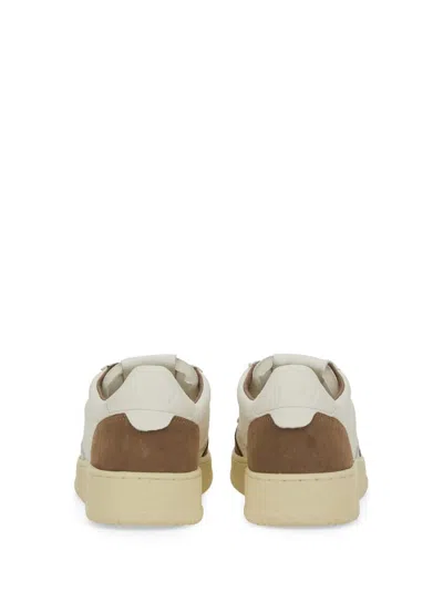 Autry Low Sneaker With Suede Accents And Perforated Toe Box In Neutral