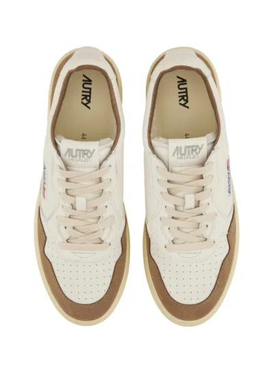 Autry Low Sneaker With Suede Accents And Perforated Toe Box In Neutral