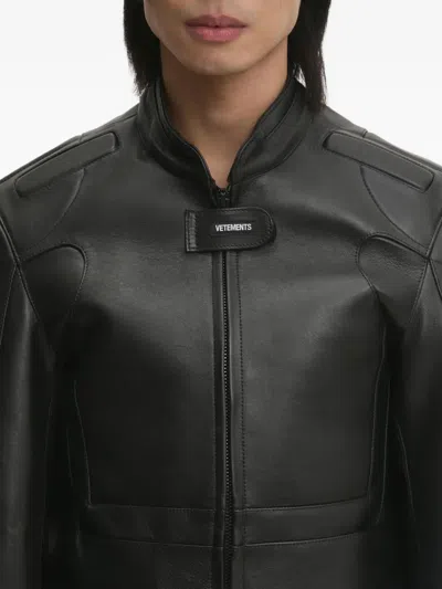 Vetements Logo-embossed Leather Jacket In Black