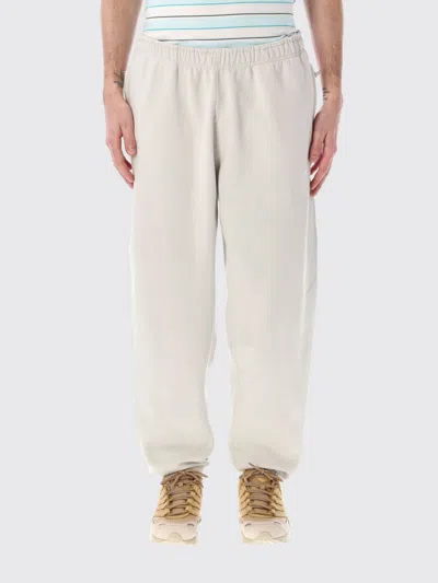 Nike Solo Swoosh Jogging Trousers With Zip Pockets In Red