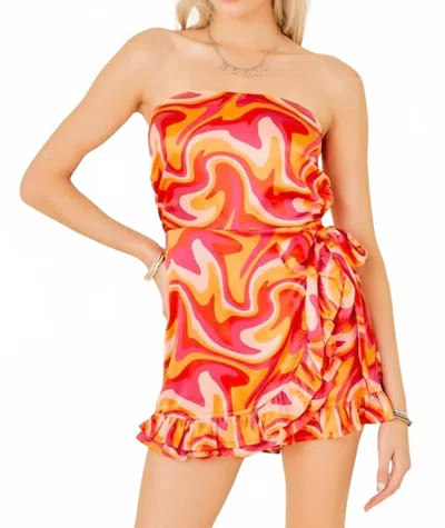 Day + Moon Lizzie Ruffled Romper In Orange Multi In Orange
