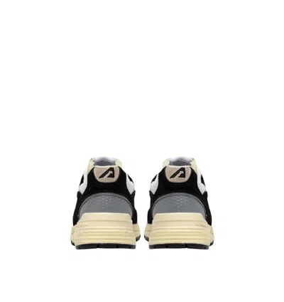 Autry Hyperway Black Low Top Sneakers With Logo Patch On Tongue And Side In Tech Fabric Man