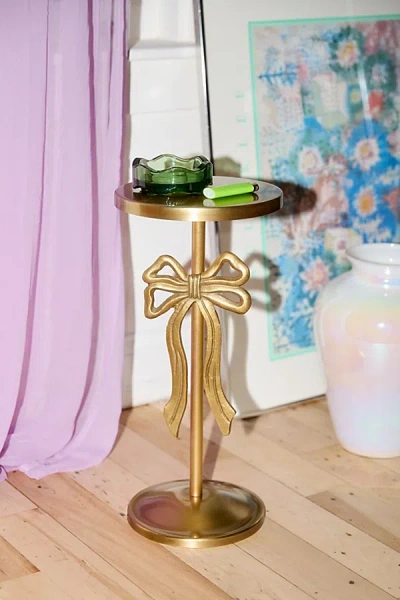 Urban Outfitters Bow Metal Drink Side Table In Brass At