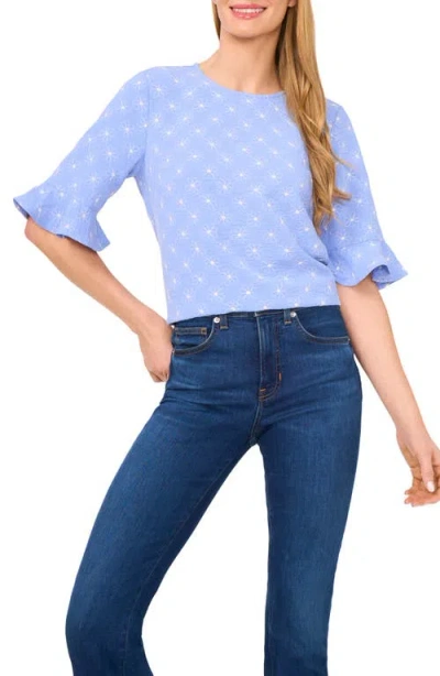 Cece Floral Embroidered Ruffle Cuff Top In Blue
