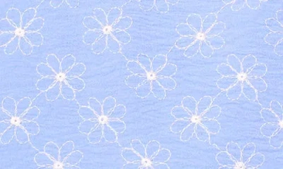 Cece Floral Embroidered Ruffle Cuff Top In Blue