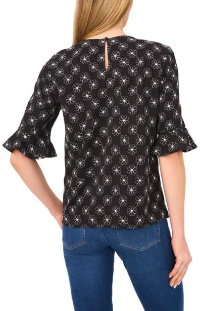 Cece Floral Embroidered Ruffle Cuff Top In Black