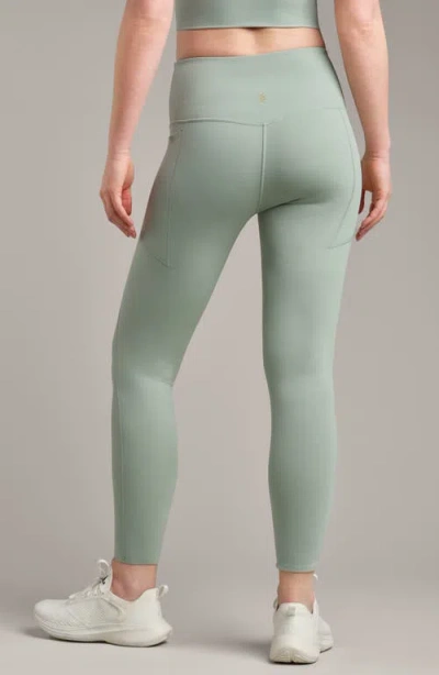Rhone Revive 7/8 Pocket Leggings In Green