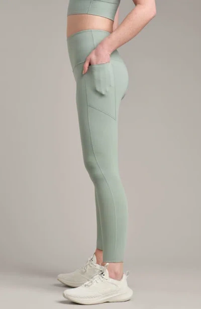 Rhone Revive 7/8 Pocket Leggings In Green
