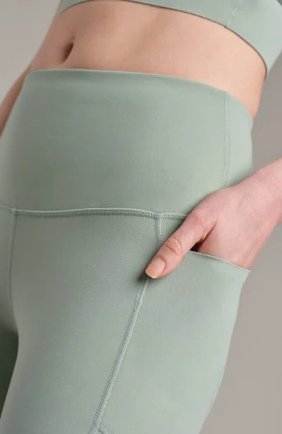 Rhone Revive 7/8 Pocket Leggings In Green