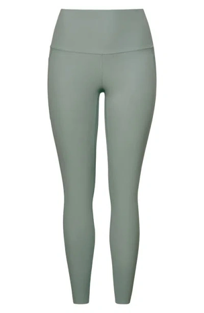 Rhone Revive 7/8 Pocket Leggings In Green