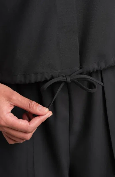 Rhone Mirage Sleeveless Performance Button-up Shirt In Black
