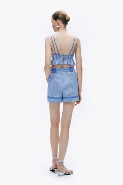 Nocturne Lace-up Mini Shorts In Blue