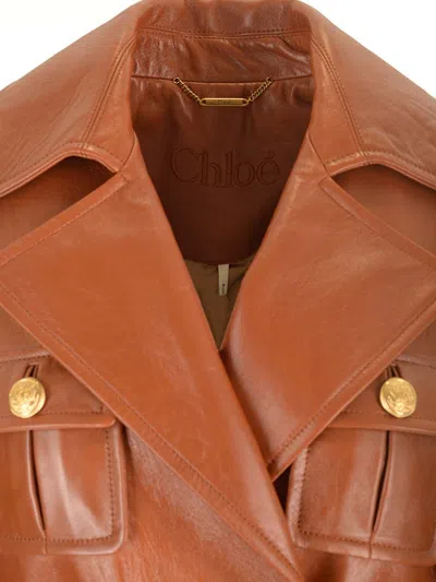 Chloé Glossy Leather Belted Long Trench Coat In Brown