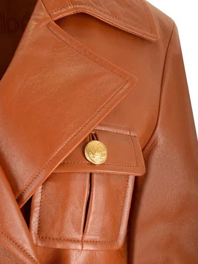 Chloé Glossy Leather Belted Long Trench Coat In Brown
