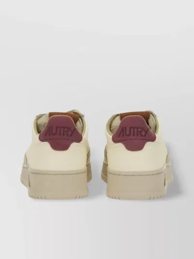 Autry Sneakers With Contrasting Heel Tab And Perforated Toe