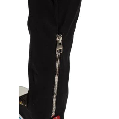 Alexander Mcqueen Pleat-front Trousers In Black