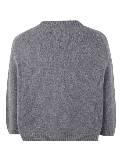 Khaite Long-sleeved Knitted Sweater In Gray
