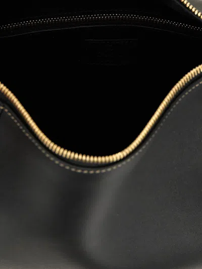 Gucci Leather Gg Emblem Structured Shoulder Bag In Black