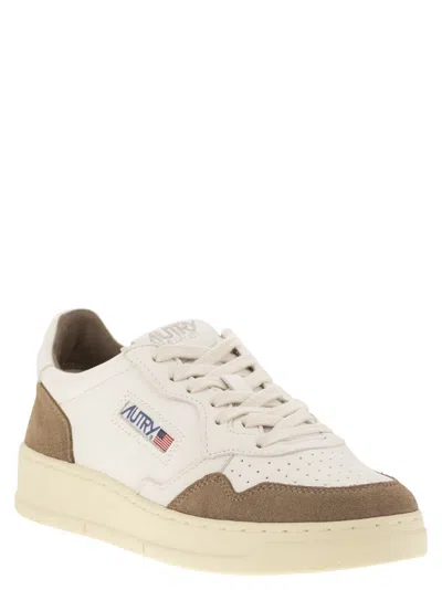 Autry Low Sneaker With Suede Accents And Perforated Toe Box