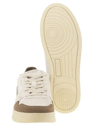 Autry Low Sneaker With Suede Accents And Perforated Toe Box