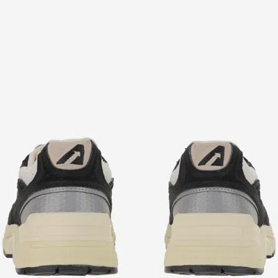 Autry Hyperway Black Low Top Sneakers With Logo Patch On Tongue And Side In Tech Fabric Man