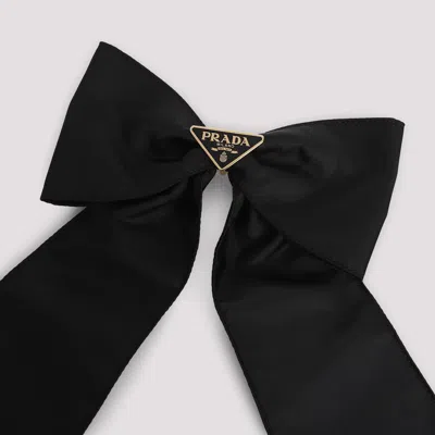 Prada Brass Hair Clip With Maxi Bow Design In Black