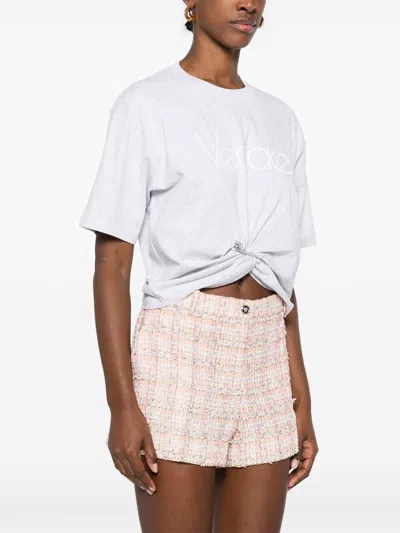 Versace Cropped T-shirt With Twist Detail And Safety Pin Logo
