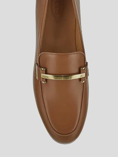 Tod's Brown Loafers With Logo Plaque In Leather Woman In Brown