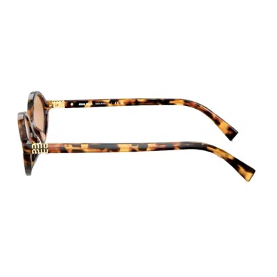 Miu Miu Tortoiseshell-effect Oval-frame Sunglasses In Brown