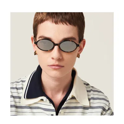 Miu Miu Tortoiseshell-effect Oval-frame Sunglasses In Brown