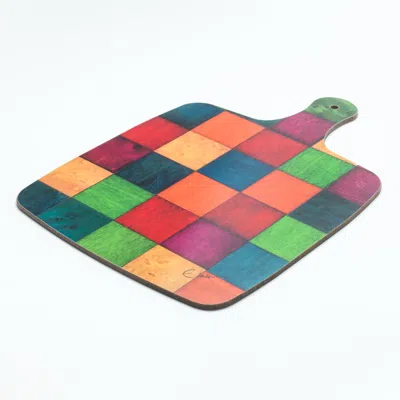 E. Inder Designs Chopping Paddle And Teapot Stand In Colours Of The Rainbow To Bring A Smile To The Cook.