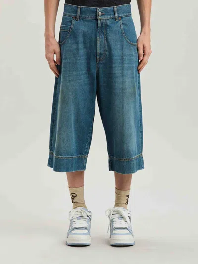Palm Angels Lasered Curved Logo Denim Skater Bermuda In Blue