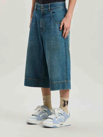 Palm Angels Lasered Curved Logo Denim Skater Bermuda In Blue