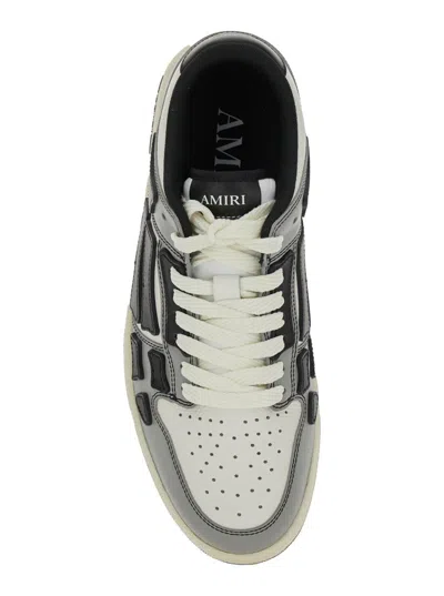 Amiri Skel Top Low Grey Sneakers With Logo Patch On Thetongue And Contrasting Details On The Side In Leath In Gray