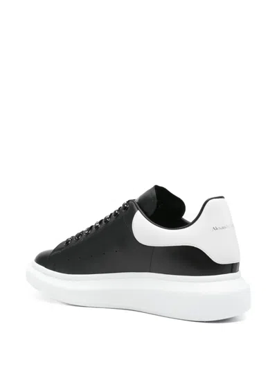 Alexander Mcqueen Black Low Top Sneakers With Chunky Sole And Contrasting Heel In Leather Man In Black