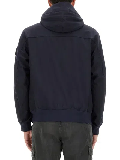 Stone Island Blue Light Soft Shell-r E. Dye Technology Jacket In Blue