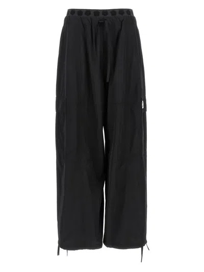 Kenzo 'boke Flower 2.0' Black Pants With Flowers Embellishmed Waist And Logo Patch On The Pocket In Black