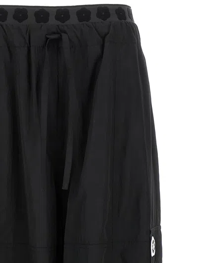 Kenzo 'boke Flower 2.0' Black Pants With Flowers Embellishmed Waist And Logo Patch On The Pocket In Black