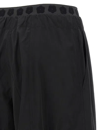 Kenzo 'boke Flower 2.0' Black Pants With Flowers Embellishmed Waist And Logo Patch On The Pocket In Black