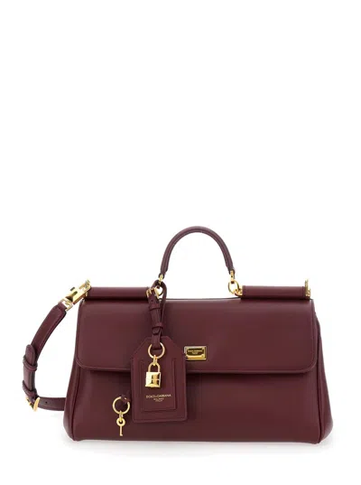 Dolce & Gabbana Bordeaux Handbag With Key And Padlock Detail And Adjustable And Removable Shoulder Strap