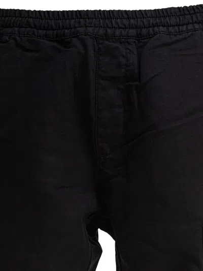 C.p. Company Relaxed Fit Straight Pants With Cargo Pocket Detail In Black