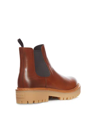 Prada Brown Leather Boots With Elastic Side Panels And Durable Sole In Brown