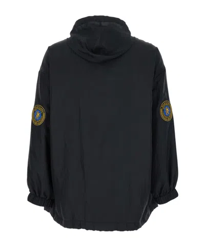 Balenciaga Hooded Raincoat With Drawstring And Pockets In Black